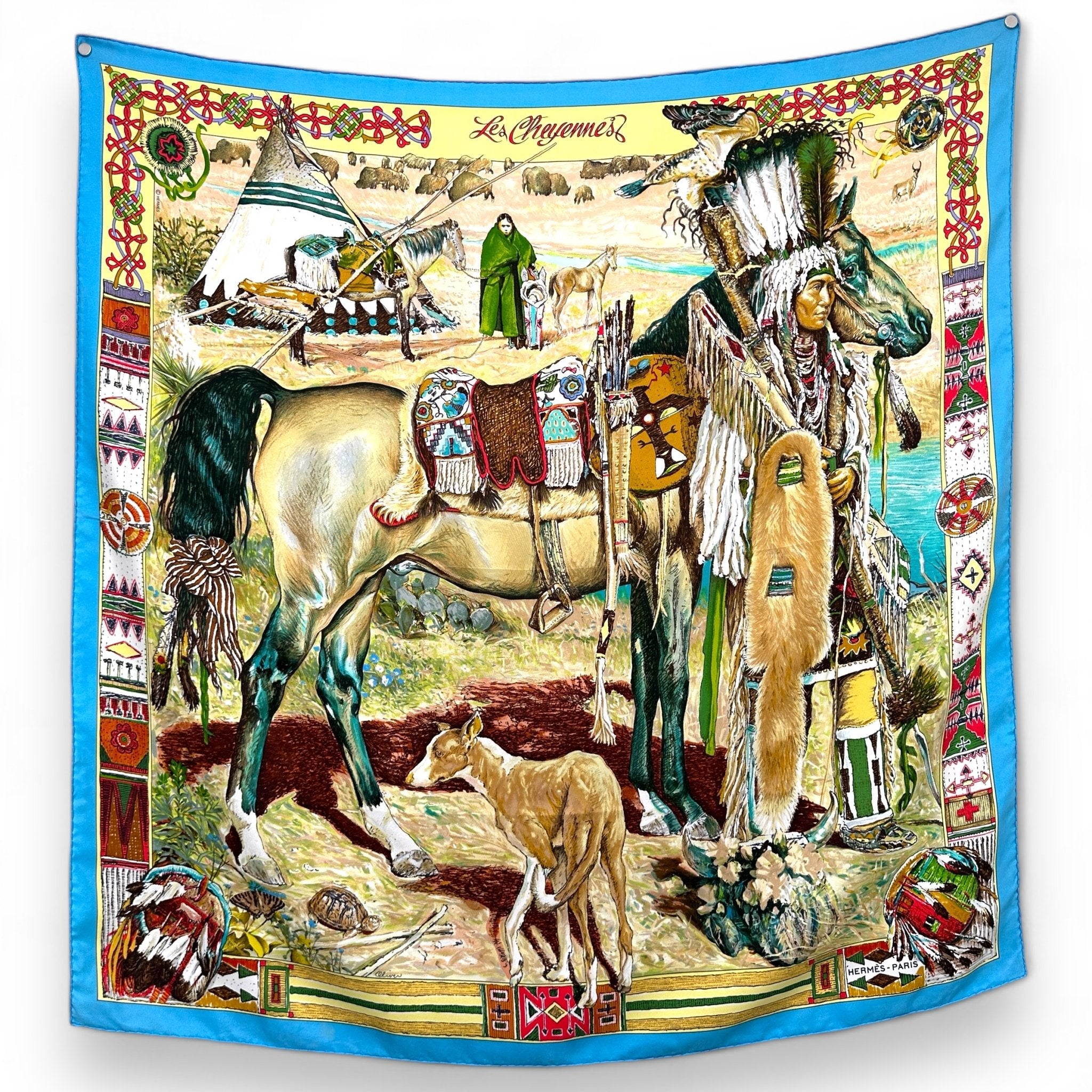 foulard avec un dessin d'un cheyenne tenant un cheval avec une femme et une tente d'indien derriere lui