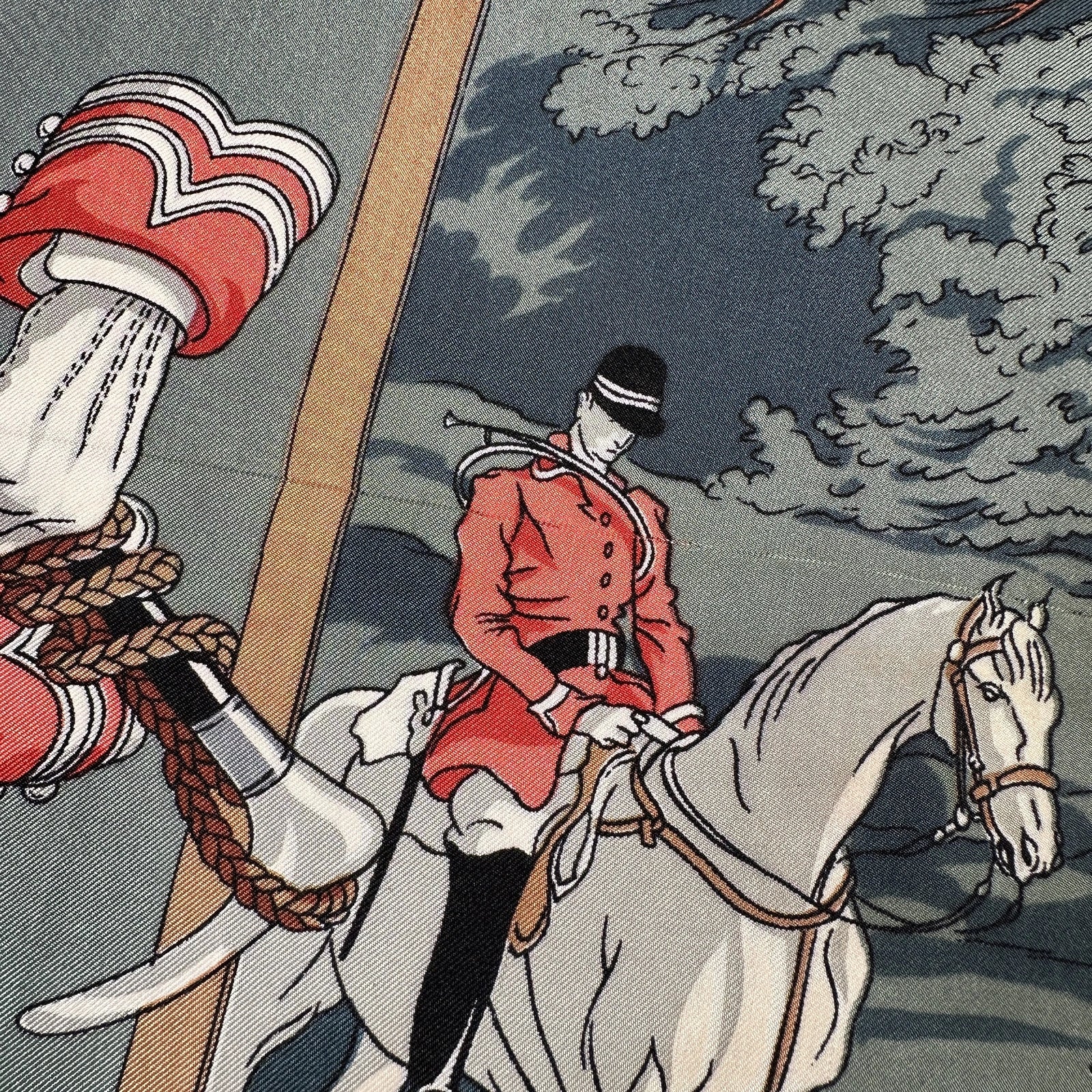 Carré Hermès Chasse à courre – zoom sur un fil tiré