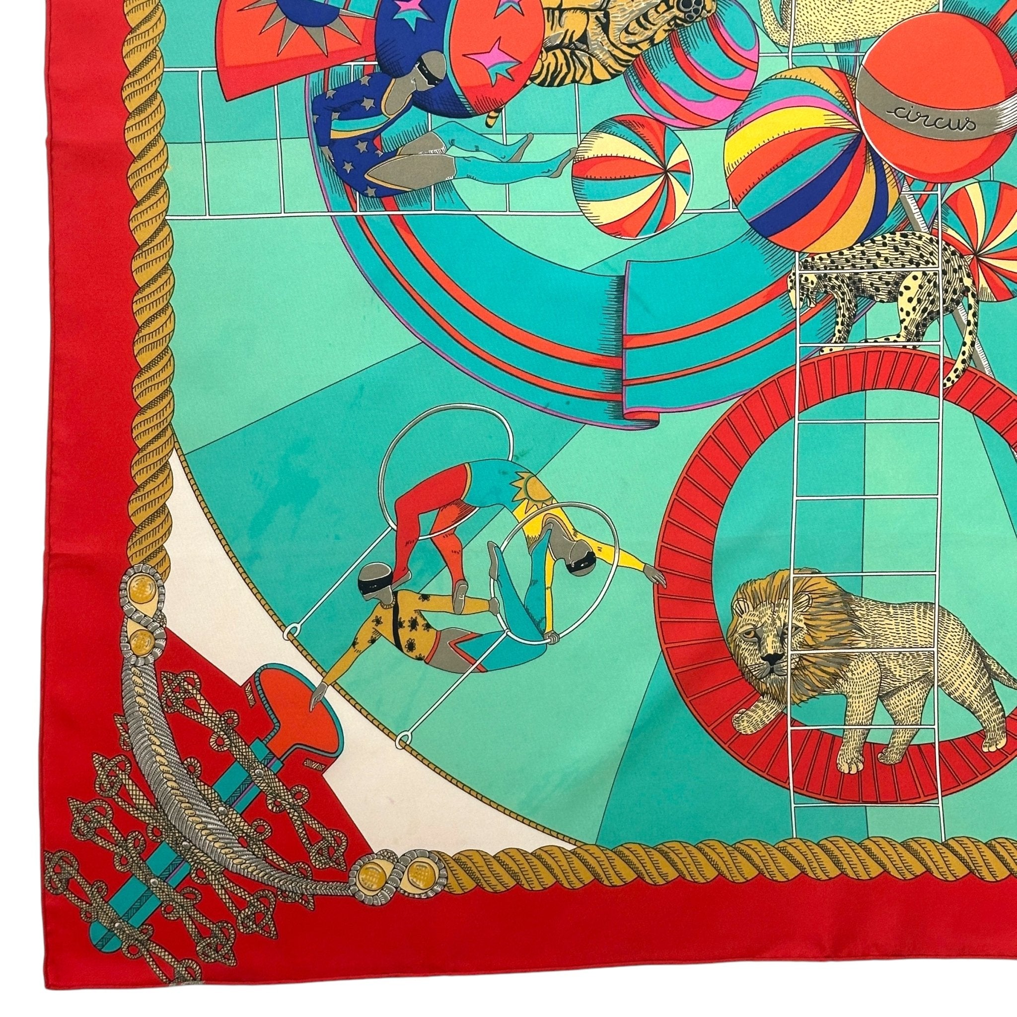 foulard hermes d'occasion circus entourage couleur corail par annie faivre en bon etat 