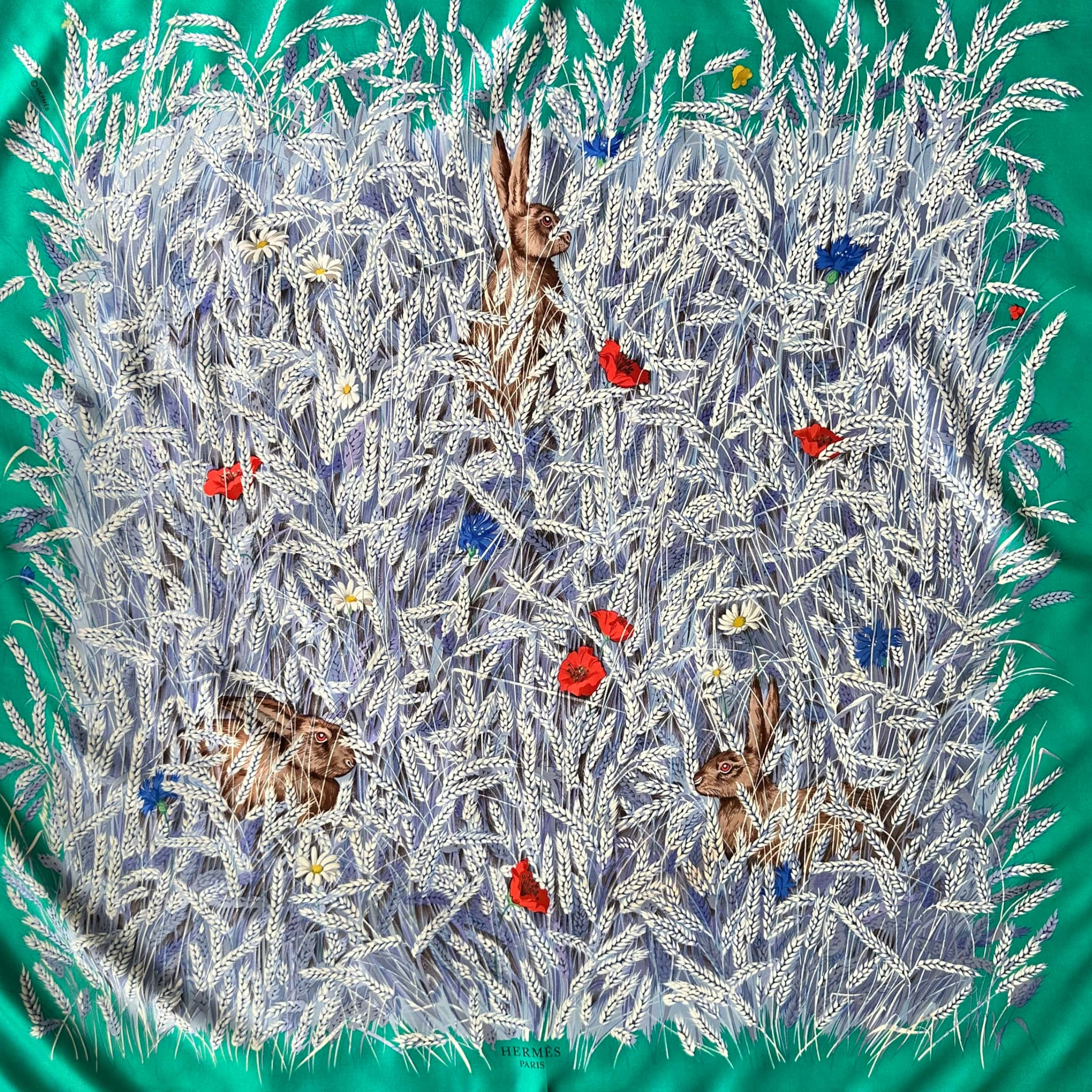 trois lapins dans les blés illustrent la finesse du dessin de Hugo Grygkar